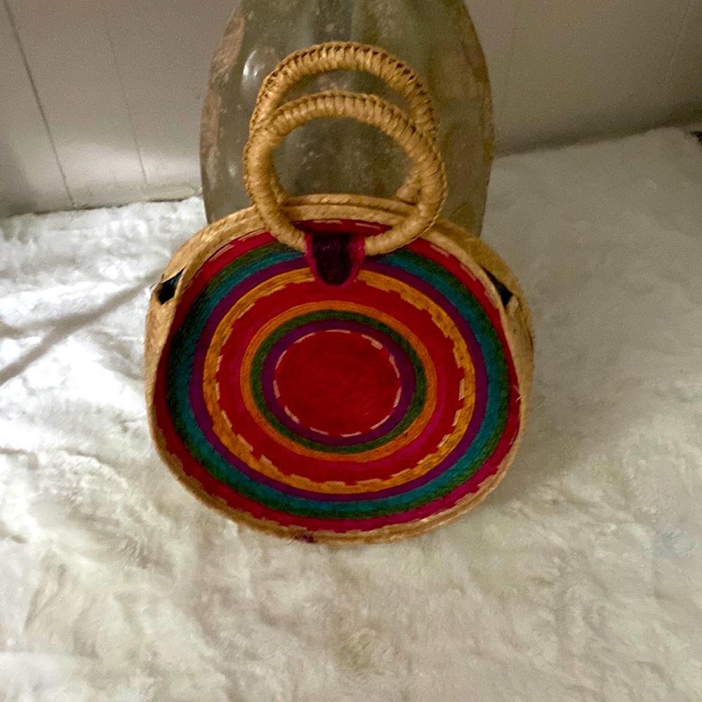 Handmade bag new never used. Beautiful bag and can hold lots of stuff.